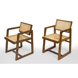 Pierre JEANNERET. Fauteuil dit "Cane seat cane back office chair", en teck massif avec assise et dossier en cannage tressé.