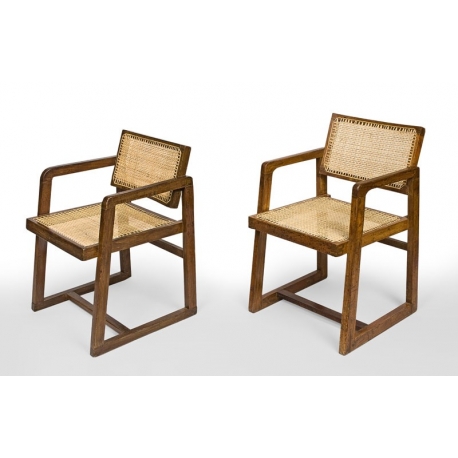 Pierre JEANNERET. Fauteuil dit "Cane seat cane back office chair", en teck massif avec assise et dossier en cannage tressé.