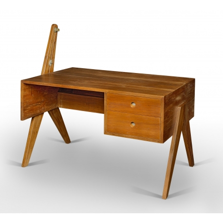 Pierre JEANNERET. Bureau en teck massif. Plateau rectangulaire fixé sur double piètements latéraux type "compas" asymétriques.